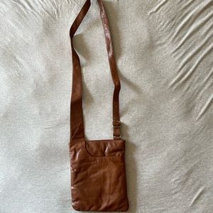 Carmel brown adjustable strap leather Crossbody bag w/ print fabric lining